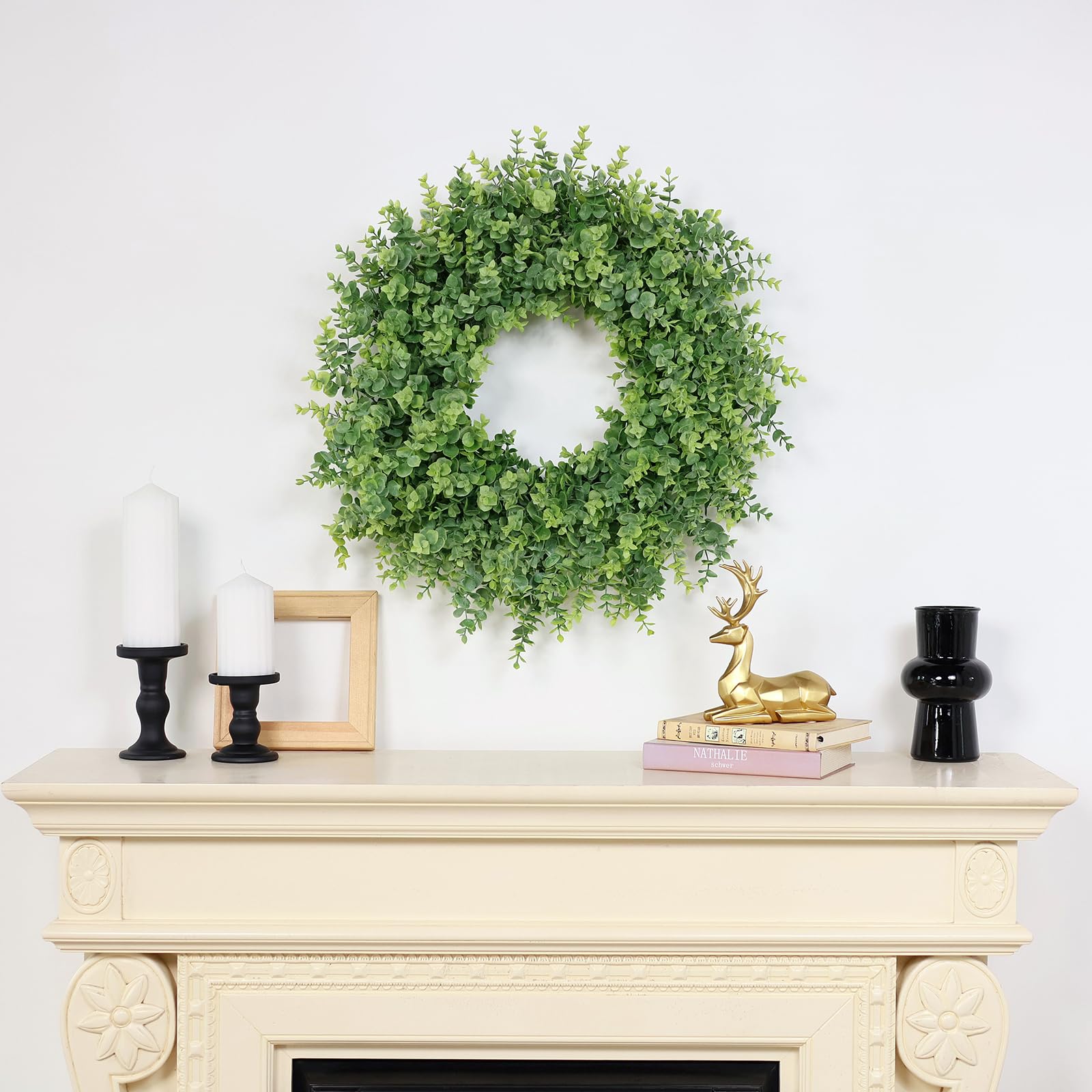 GLIDLION wreath on mantel brings year-round greenery to room
