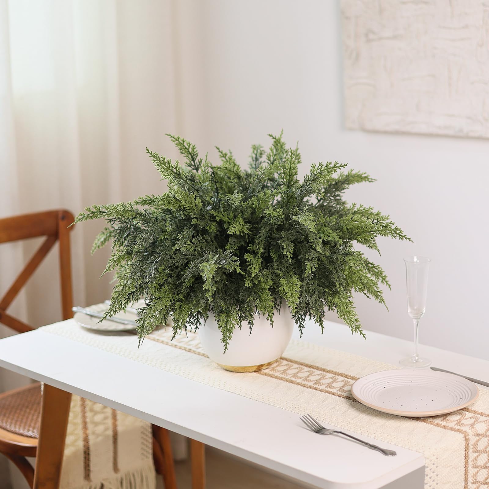 GLIDLION cedar branches styled on a mantel, enhances seasonal display