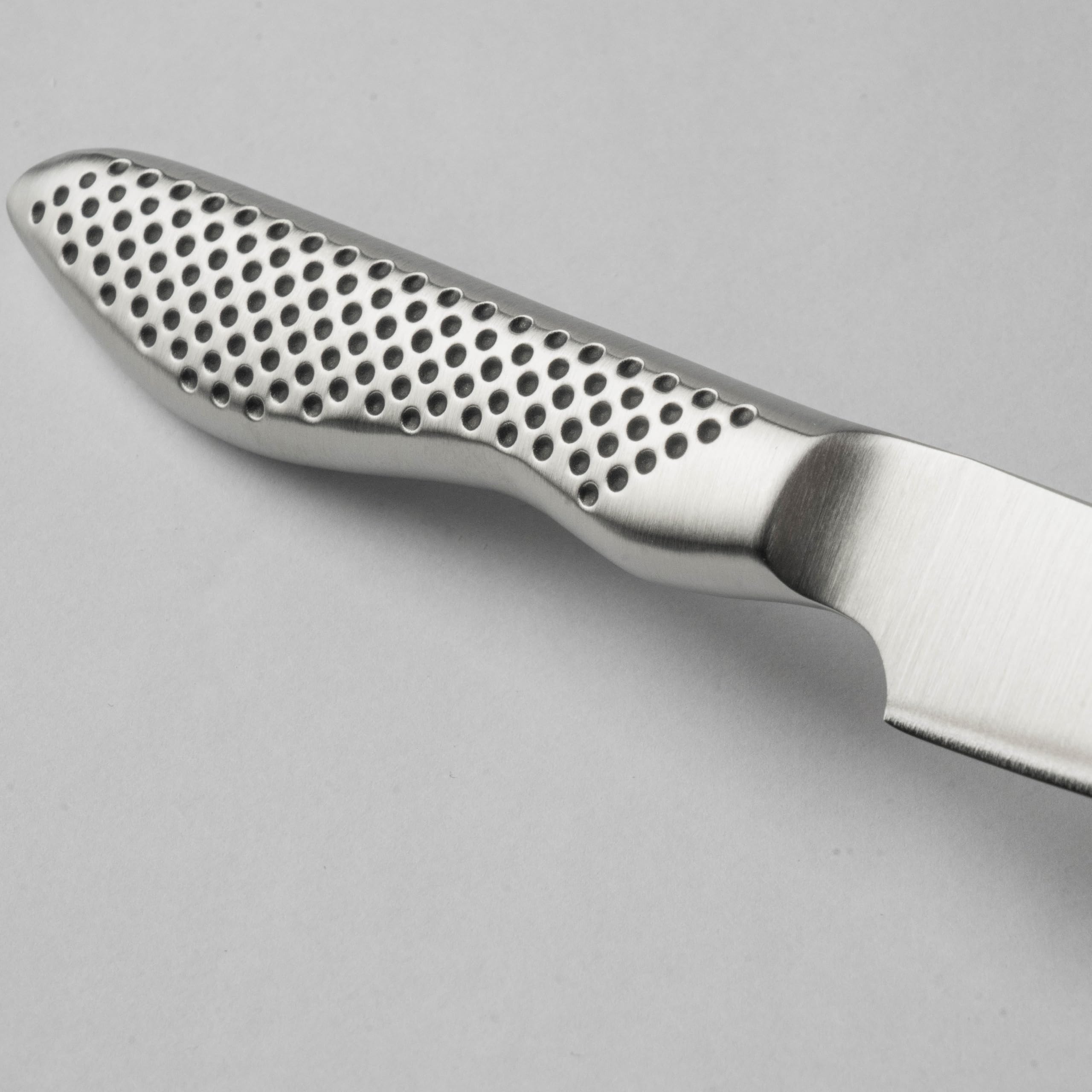 Global GS38 blade close-up highlighting stainless edge for clean cuts