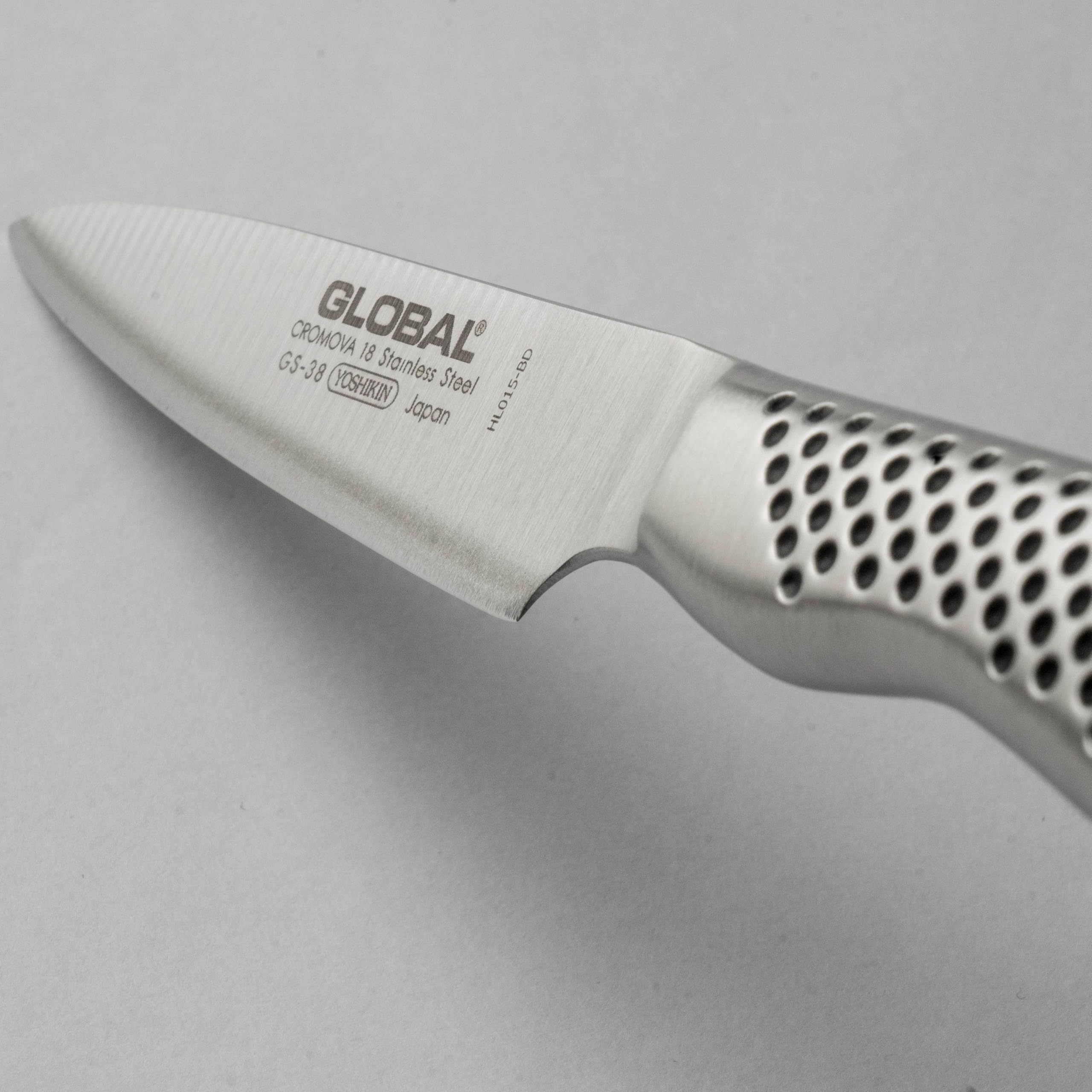 Global GS38 on cutting board showing scale for size and compactness