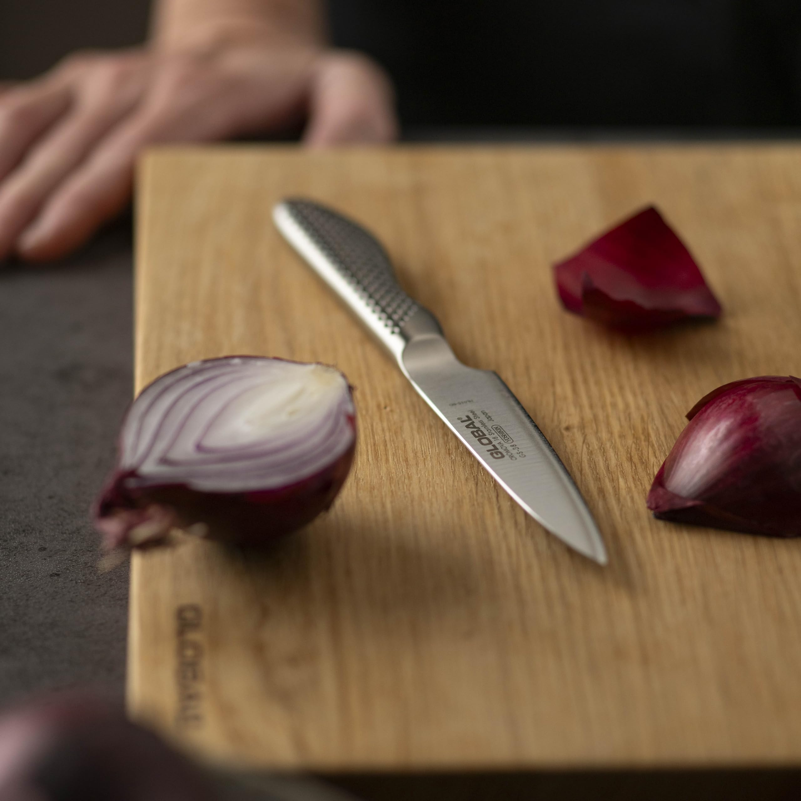 Global GS38 with other knives showing how it complements larger blades