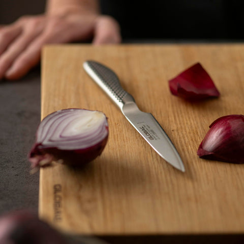 Global GS38 with other knives showing how it complements larger blades