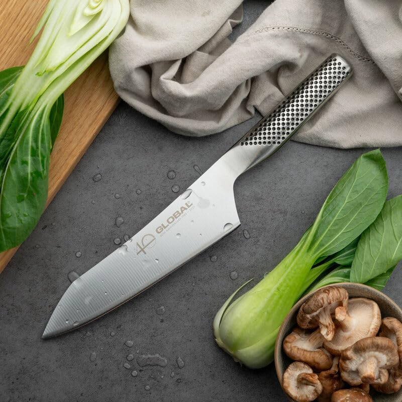 Global knives in use chopping on board illustrating efficient prep