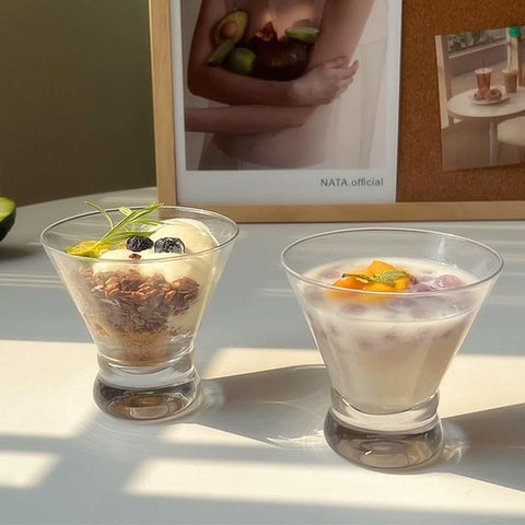 Gnimihz martini glass in use with a cosmopolitan showcasing presentation benefit