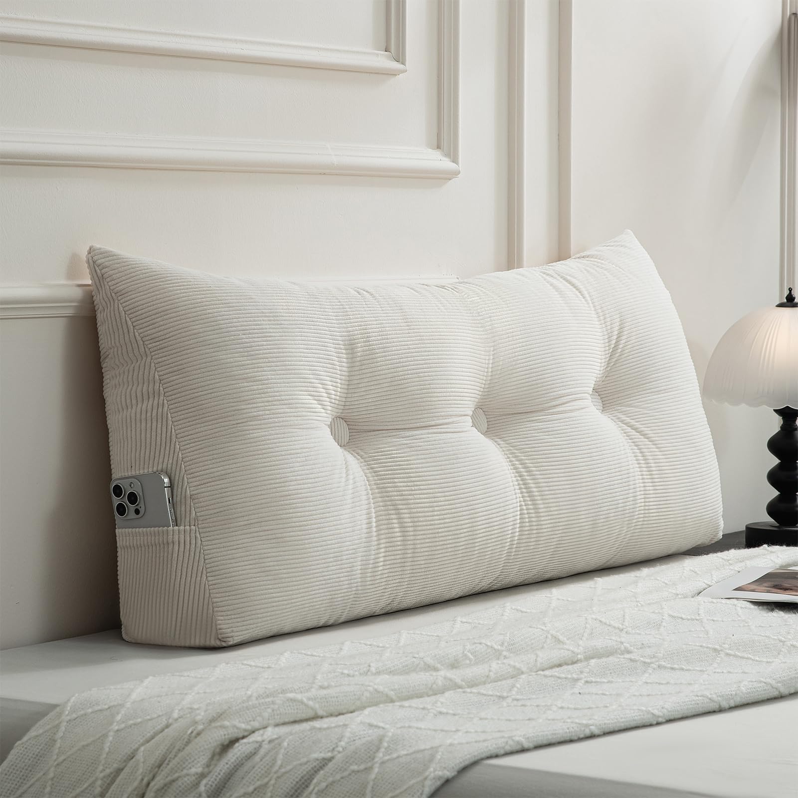 Gnostik front view of beige headboard pillow showing clean triangular profile and comfortable support