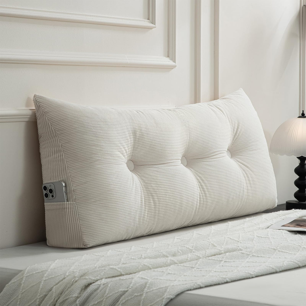Gnostik front view of beige headboard pillow showing clean triangular profile and comfortable support