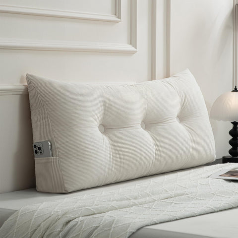 Gnostik front view of beige headboard pillow showing clean triangular profile and comfortable support
