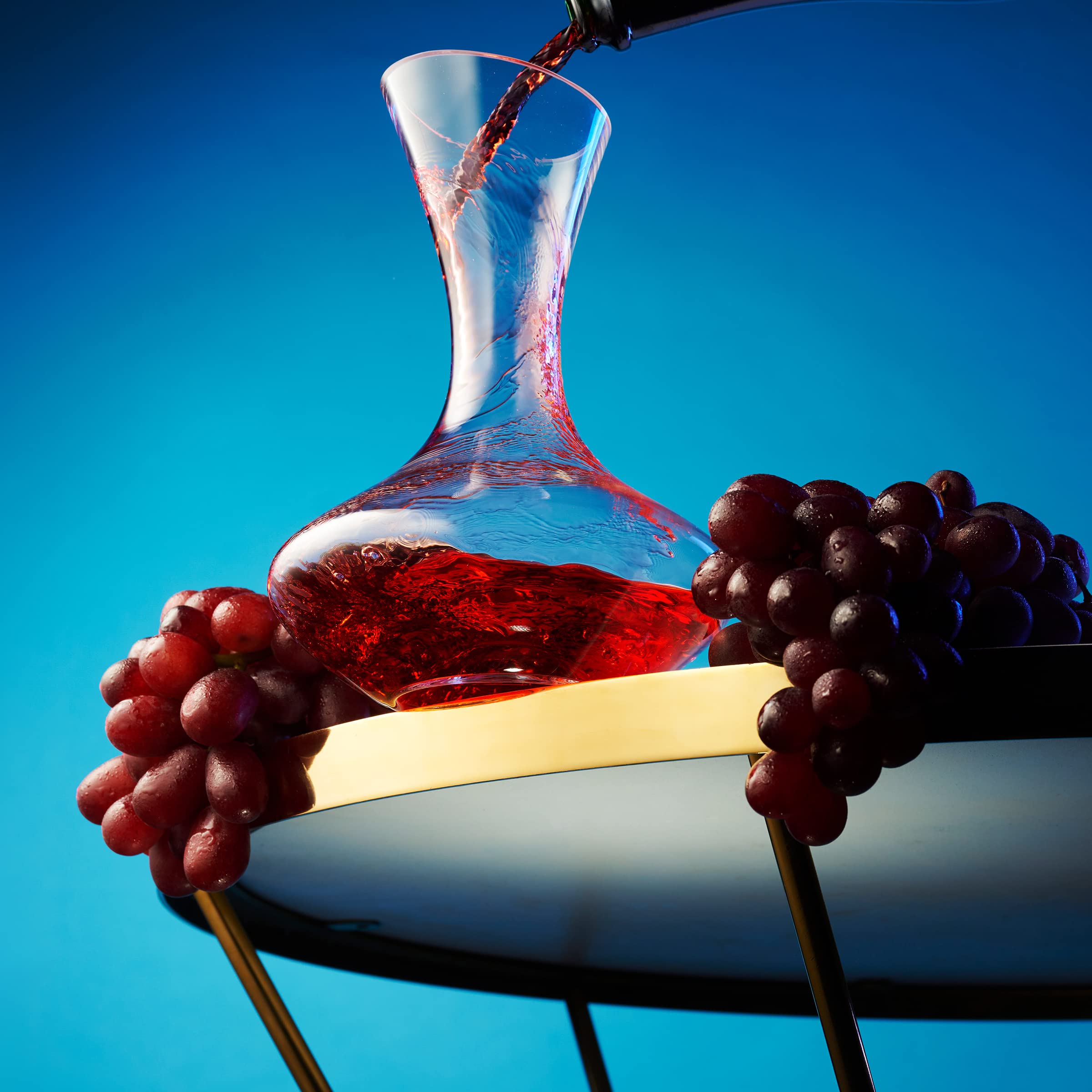 Godinger decanter on dining table styled for entertaining and aesthetic centerpiece benefit