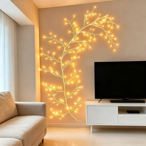 GOESWELL holiday display mixing willow vine lights with wreath ornaments