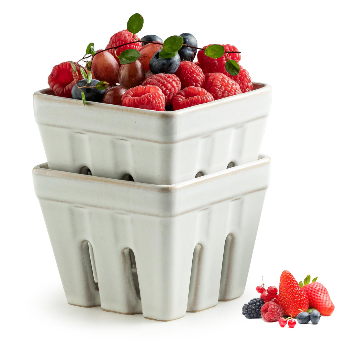 Gomakren front view of two white ceramic berry baskets showing clean design and utility