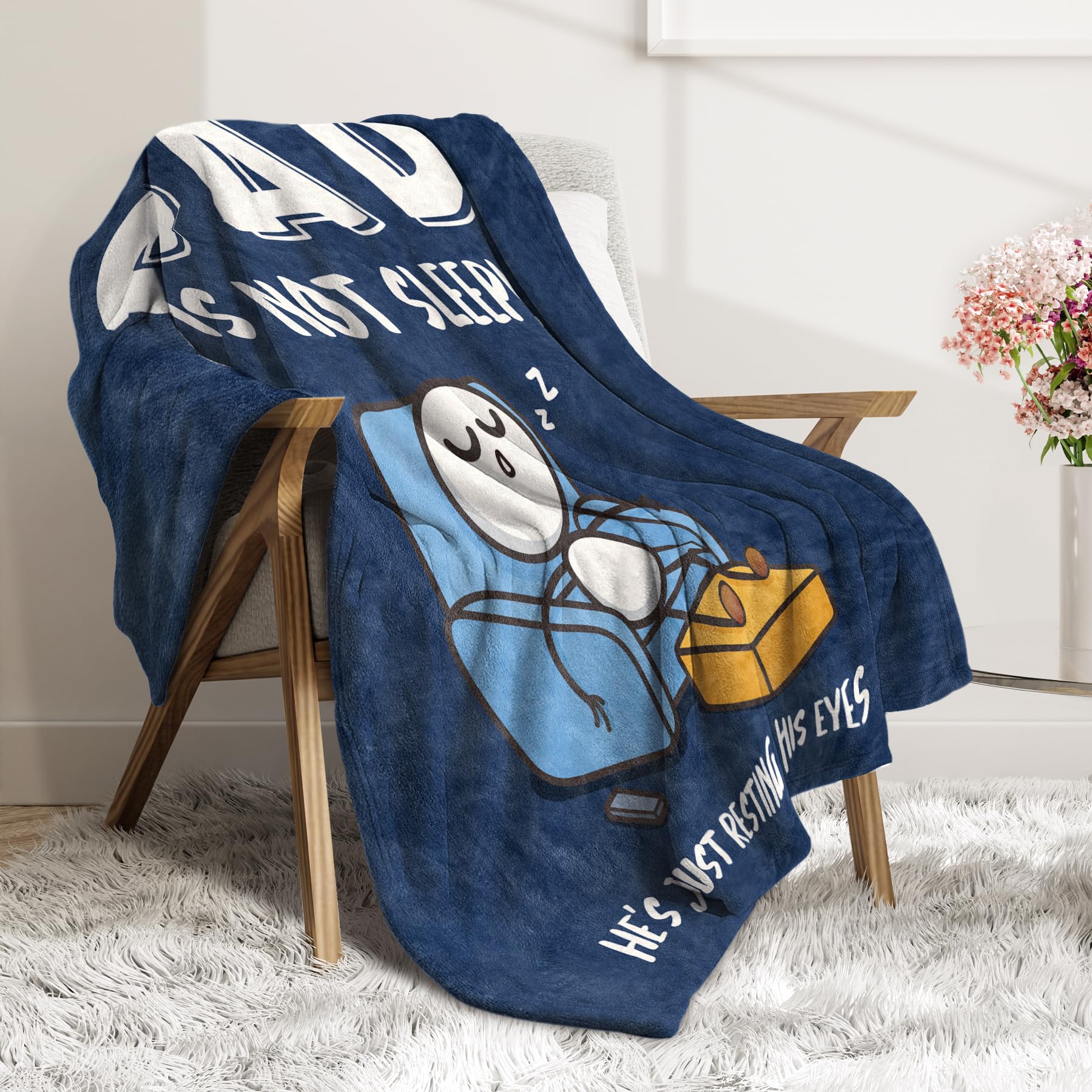 GoMelley blanket draped over dad on couch, provides cozy everyday warmth