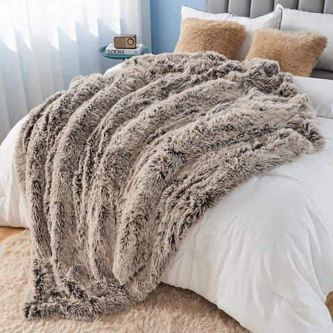GONAAP blanket draped over couch demonstrating cozy layering and decorative appeal