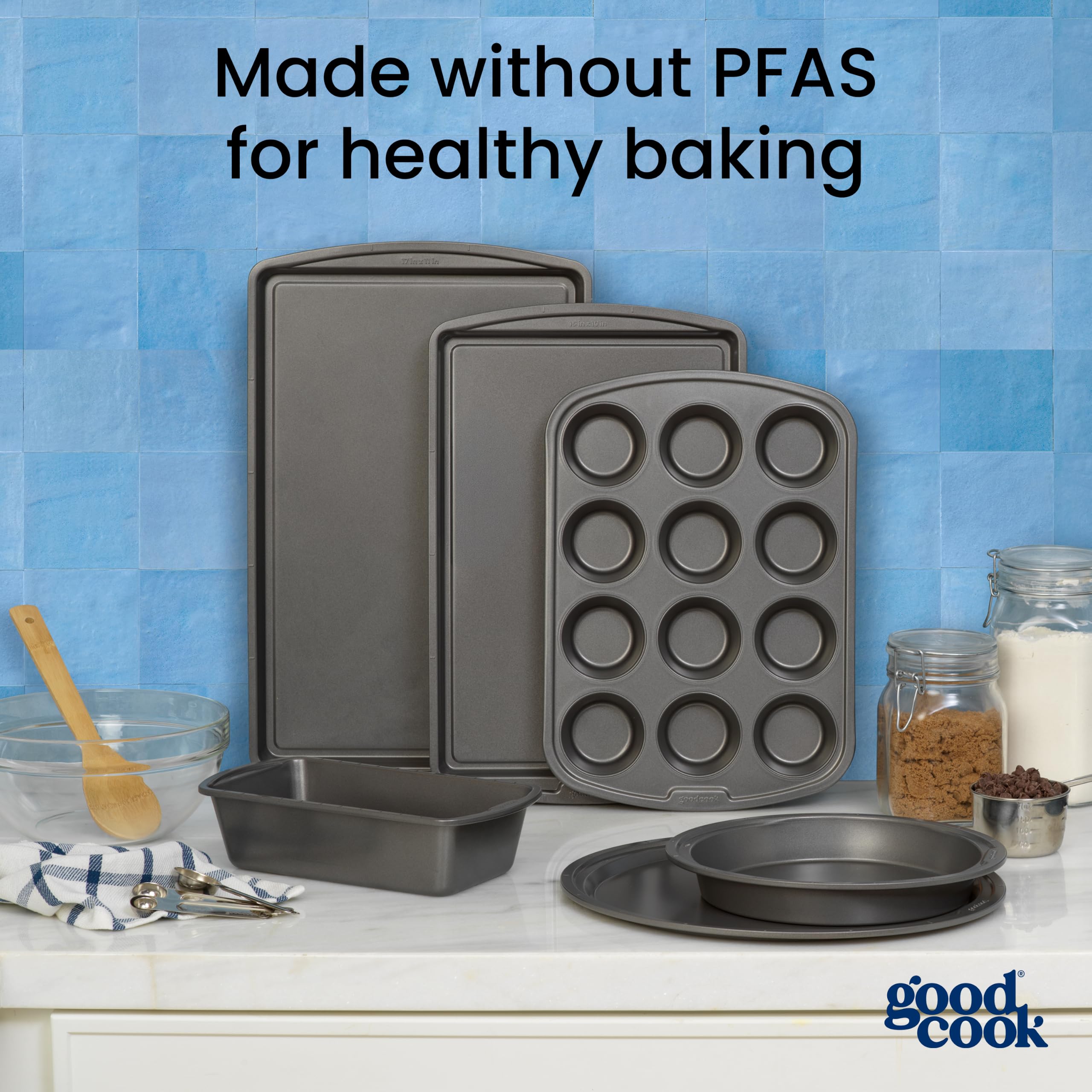 GoodCook hand holding pan for scale to show 13x9 size and easy handling benefit