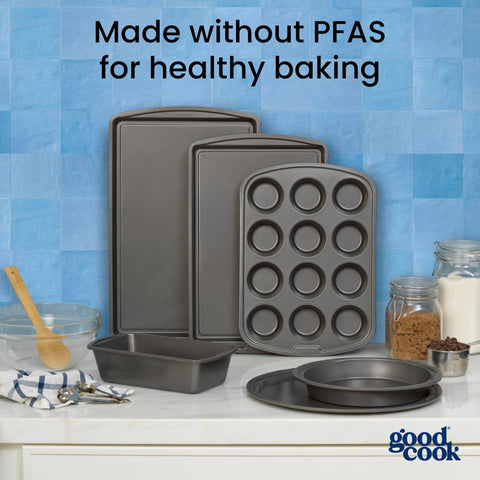 GoodCook hand holding pan for scale to show 13x9 size and easy handling benefit