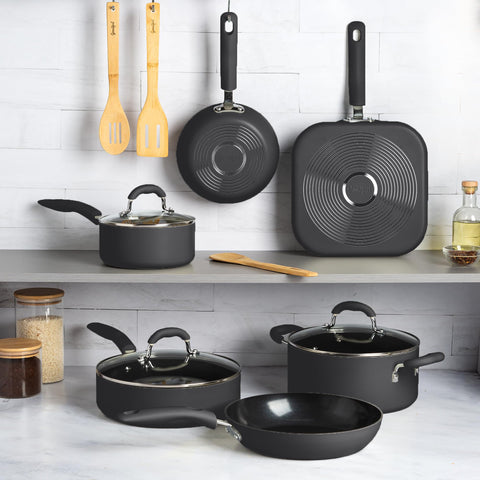 Goodful cookware next to common utensils showing scale and home-kitchen suitability
