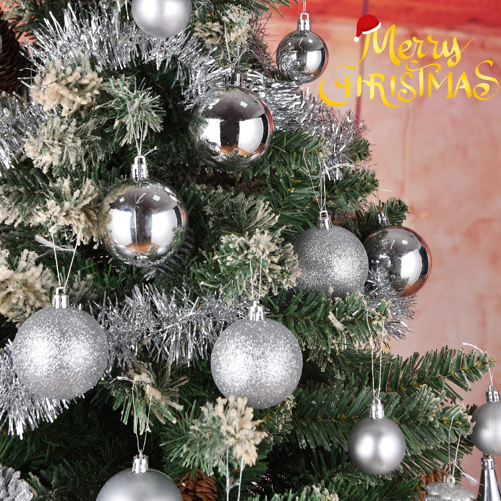 GOODLYGHTS ornaments hung on a decorated indoor Christmas tree showing cohesive silver holiday styling