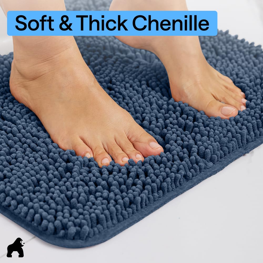 GORILLA GRIP navy mat placed at shower exit demonstrating quick water pickup benefit