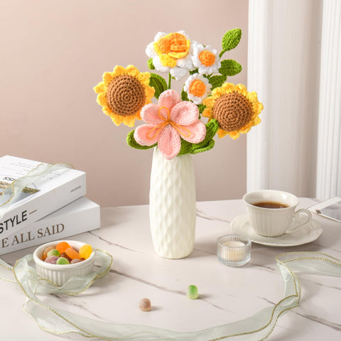 Gouraml bride holding the crochet bouquet as a wedding accessory that won’t wilt
