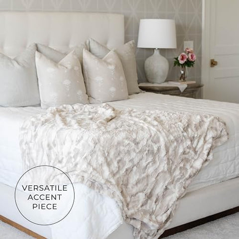 GRACED SOFT LUXURIES lifestyle scene with reader using throw showing cozy relaxation