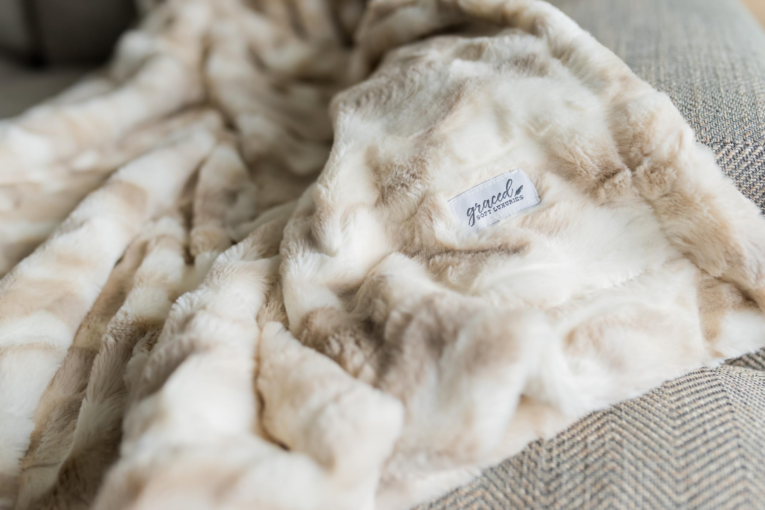 GRACED SOFT LUXURIES neatly folded throw displaying thickness and easy storage benefit
