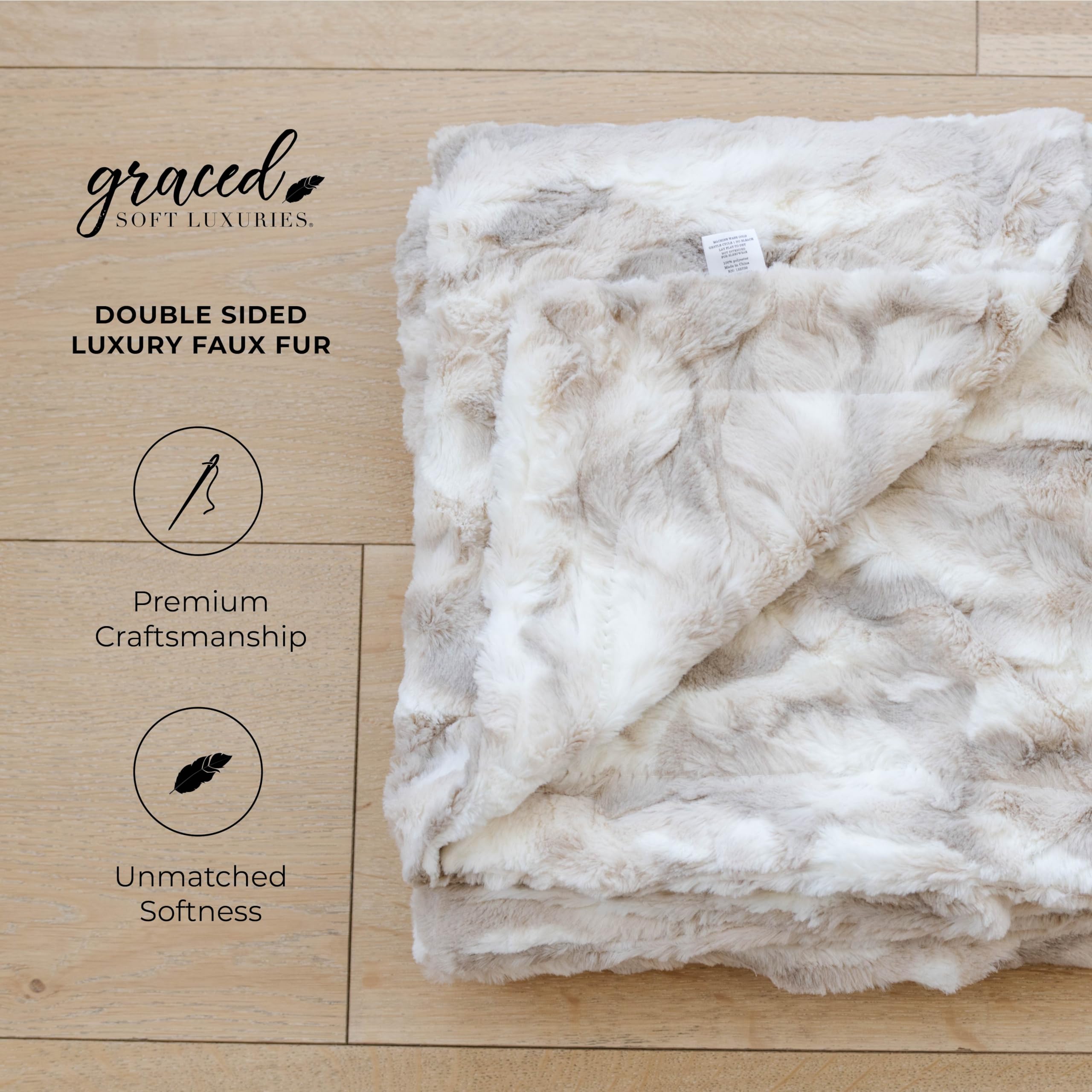 GRACED SOFT LUXURIES throw layered on bed providing warmth and a polished look