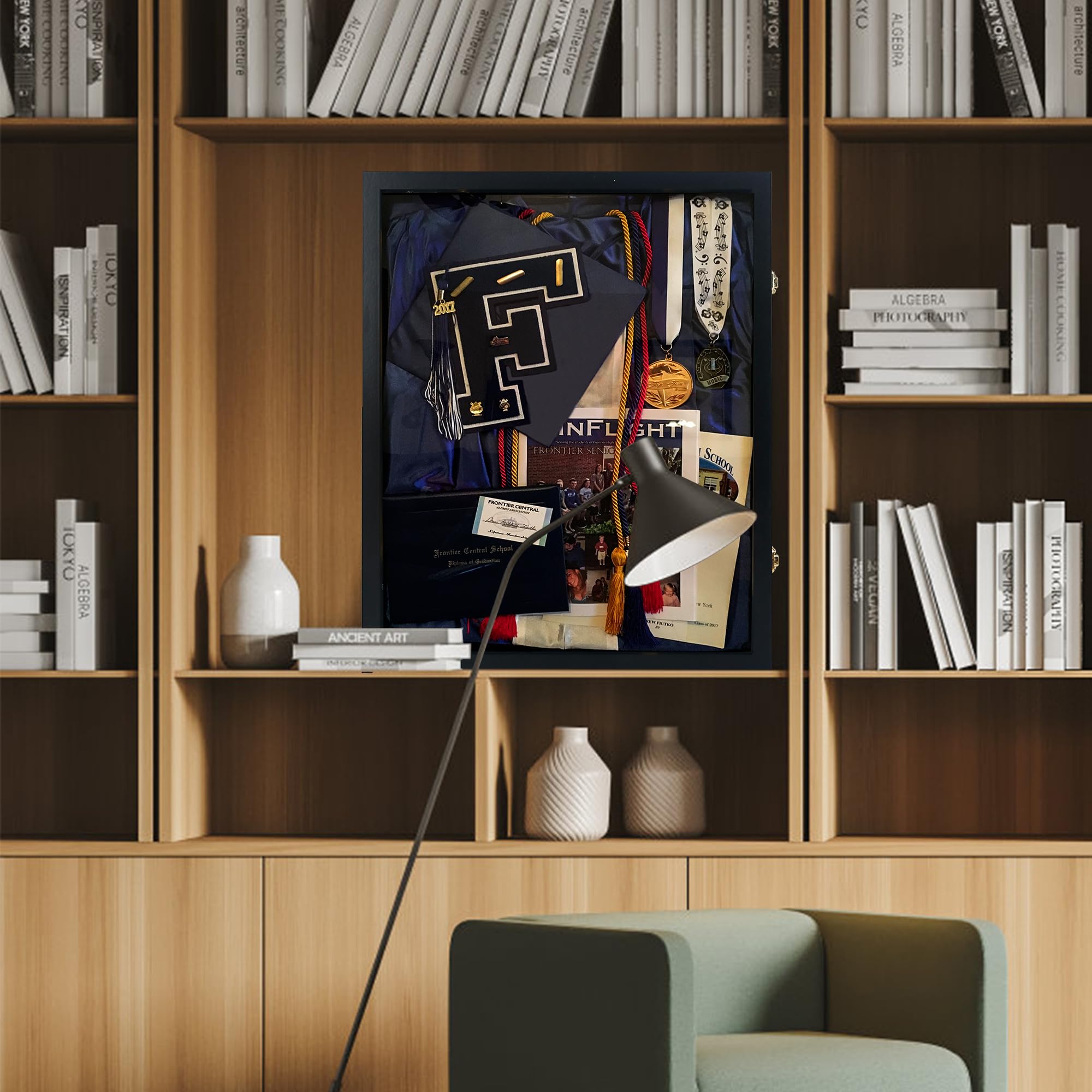 GraduationMall framed keepsakes hung on wall creating a tasteful memory display
