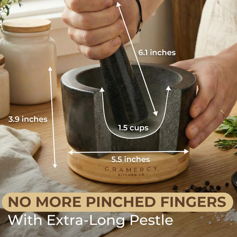Gramercy mortar in use crushing garlic for fresher flavor and texture