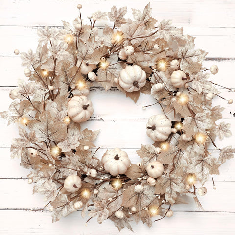 Grandeal front door wreath lit with warm LEDs enhances curb appeal