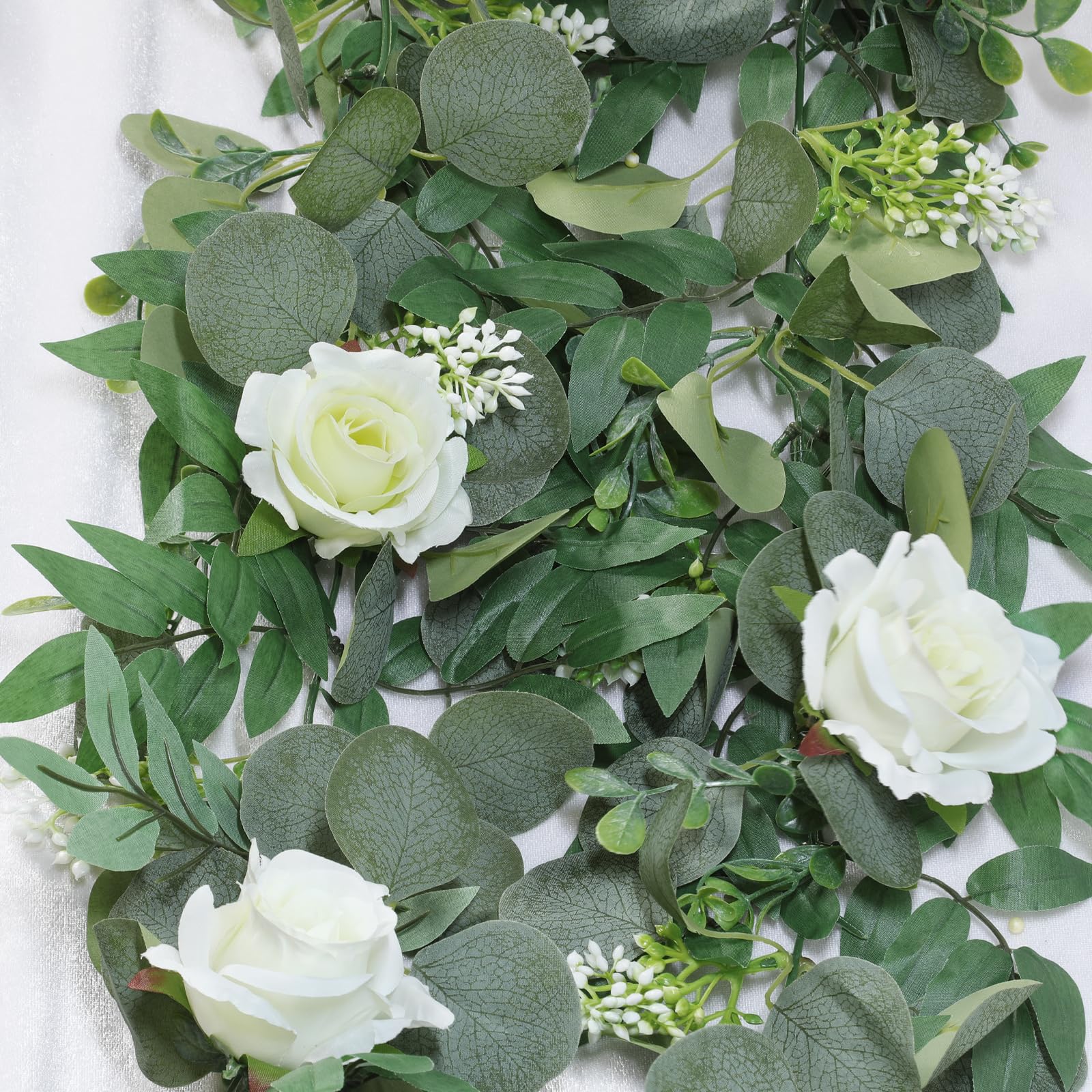 Grandeal garland held in hand showing length and flexible wired stem for easy installation