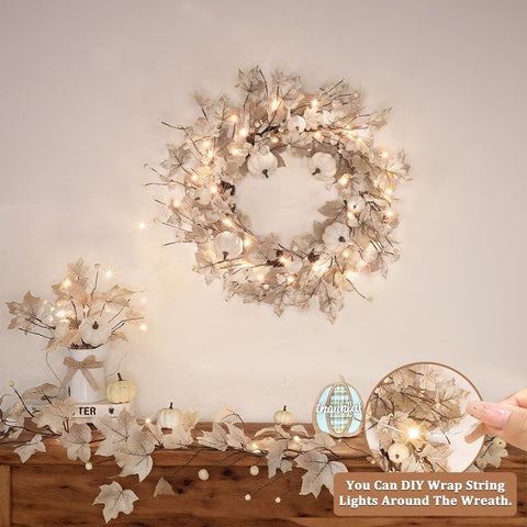 Grandeal wreath displayed on an indoor wall creating cozy autumn ambiance