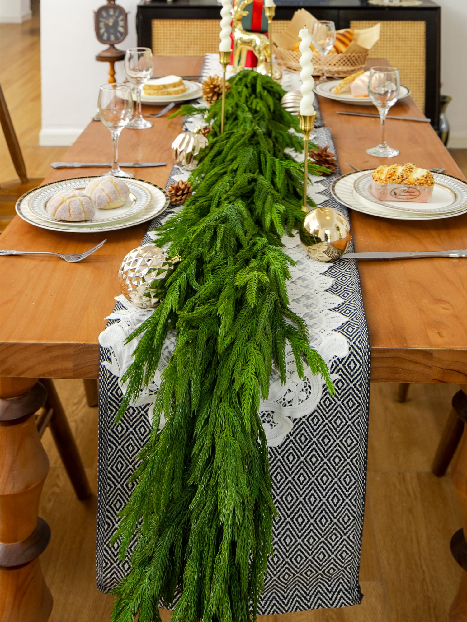 Green Moon garland wrapped on staircase banister showing secure drape and symmetry