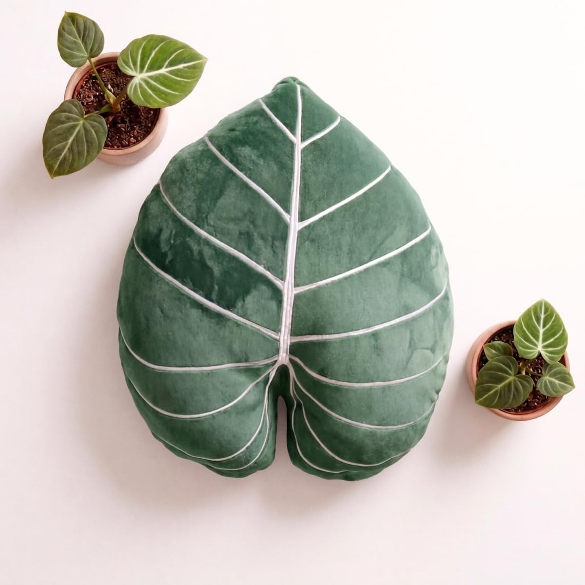 Green Philosophy Co. Leaf™ on a bed enhancing layered, cozy bedroom decor