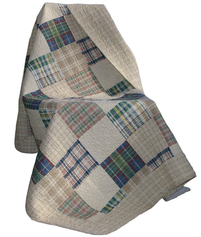 Greenland Home Fashions throw draped on sofa showing reversible plaid and styling benefit
