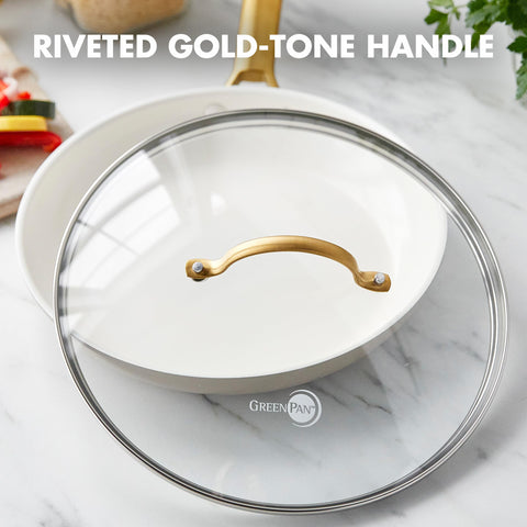 GreenPan gold-tone handle detail with rivets offering secure comfortable grip
