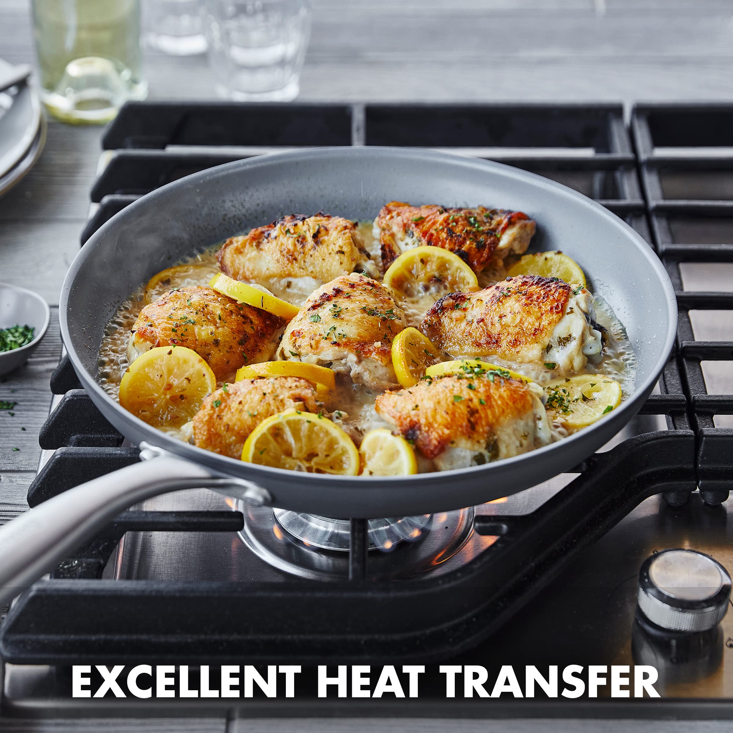 GreenPan Lima 12-inch searing steak in pan illustrating even browning and oven readiness