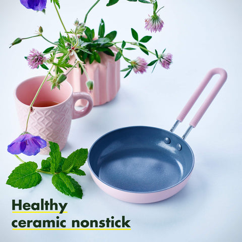 GreenPan mini silicone-wrapped handle close-up showing secure comfortable grip benefit