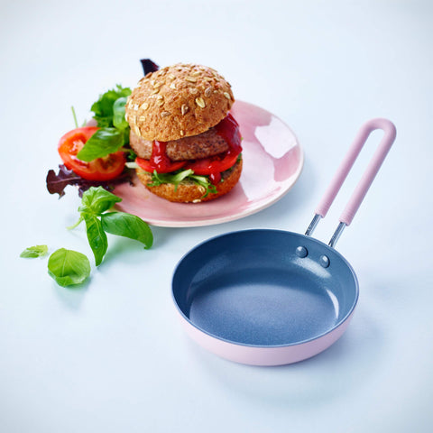 GreenPan mini top view with egg cooking demonstrating even nonstick release benefit