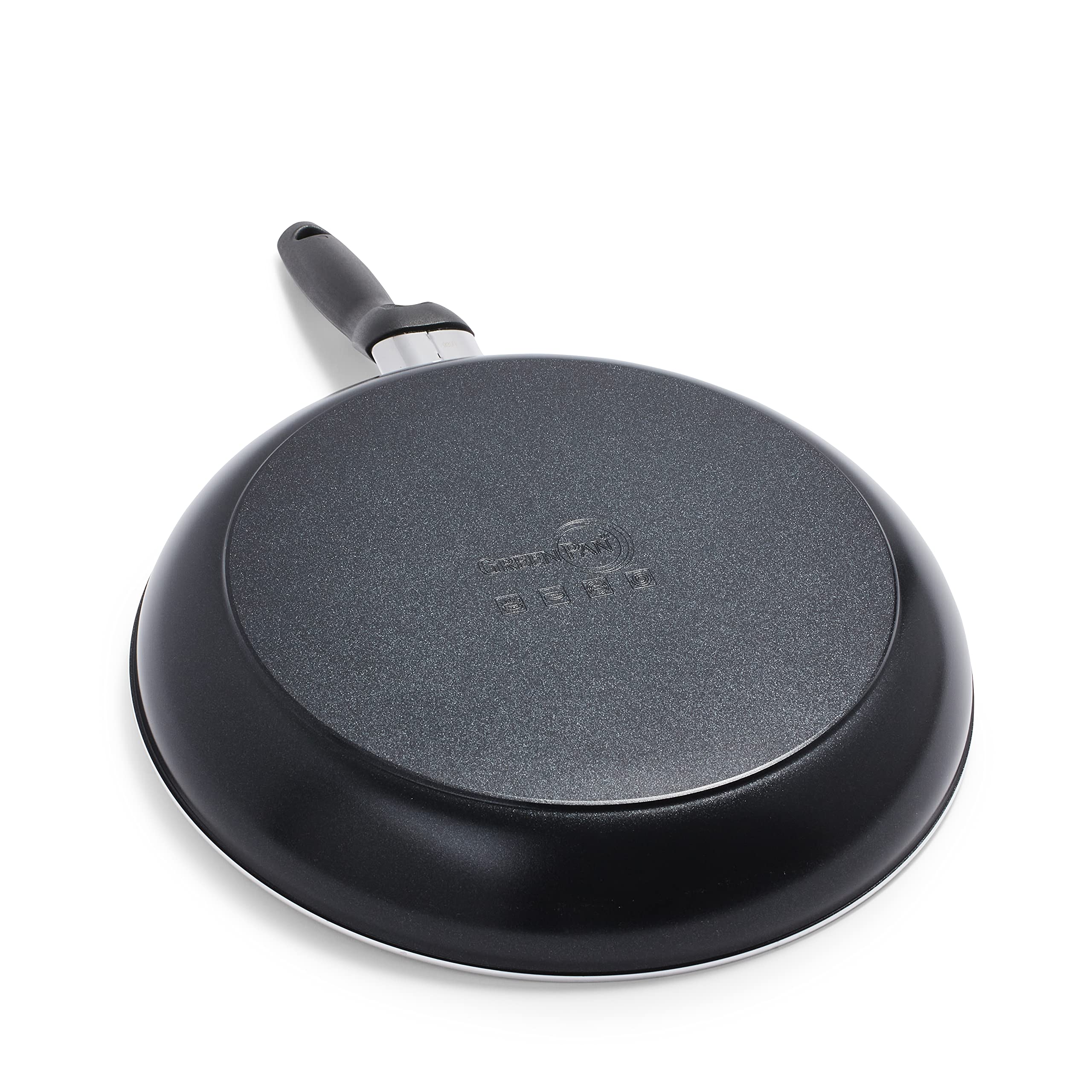 GreenPan Rio stock pot with stainless-steel steamer next to measuring cup showing capacity scale