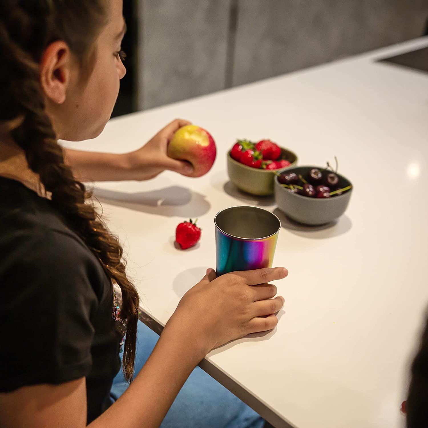 Greens Steel cup held in hand showing true 16 oz scale for portion clarity