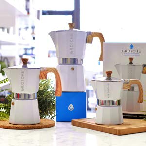 GROSCHE Milano next to a cup showing 15.2oz scale for portion clarity