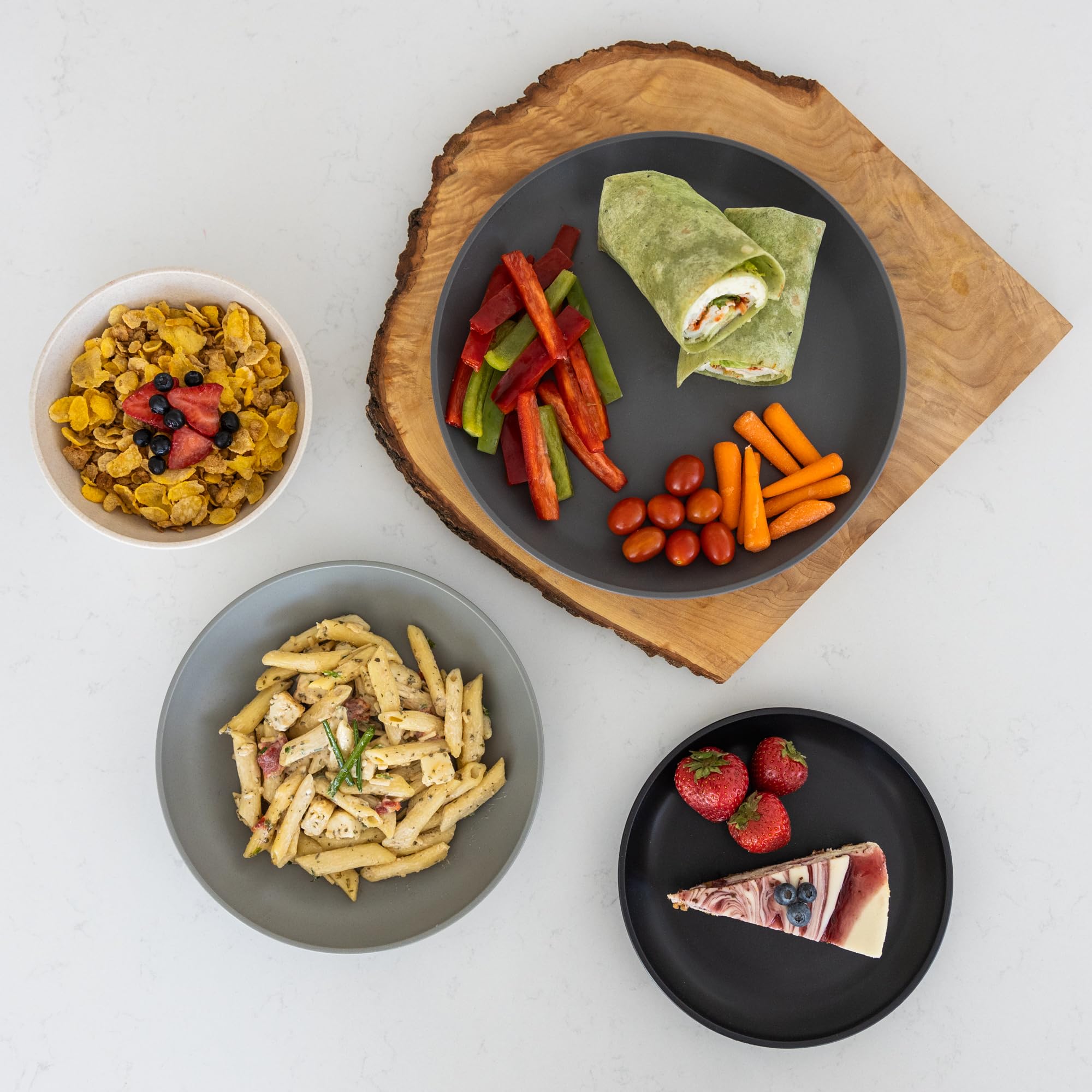 Grow Forward plates and bowls in outdoor picnic scene showing unbreakable convenience and style