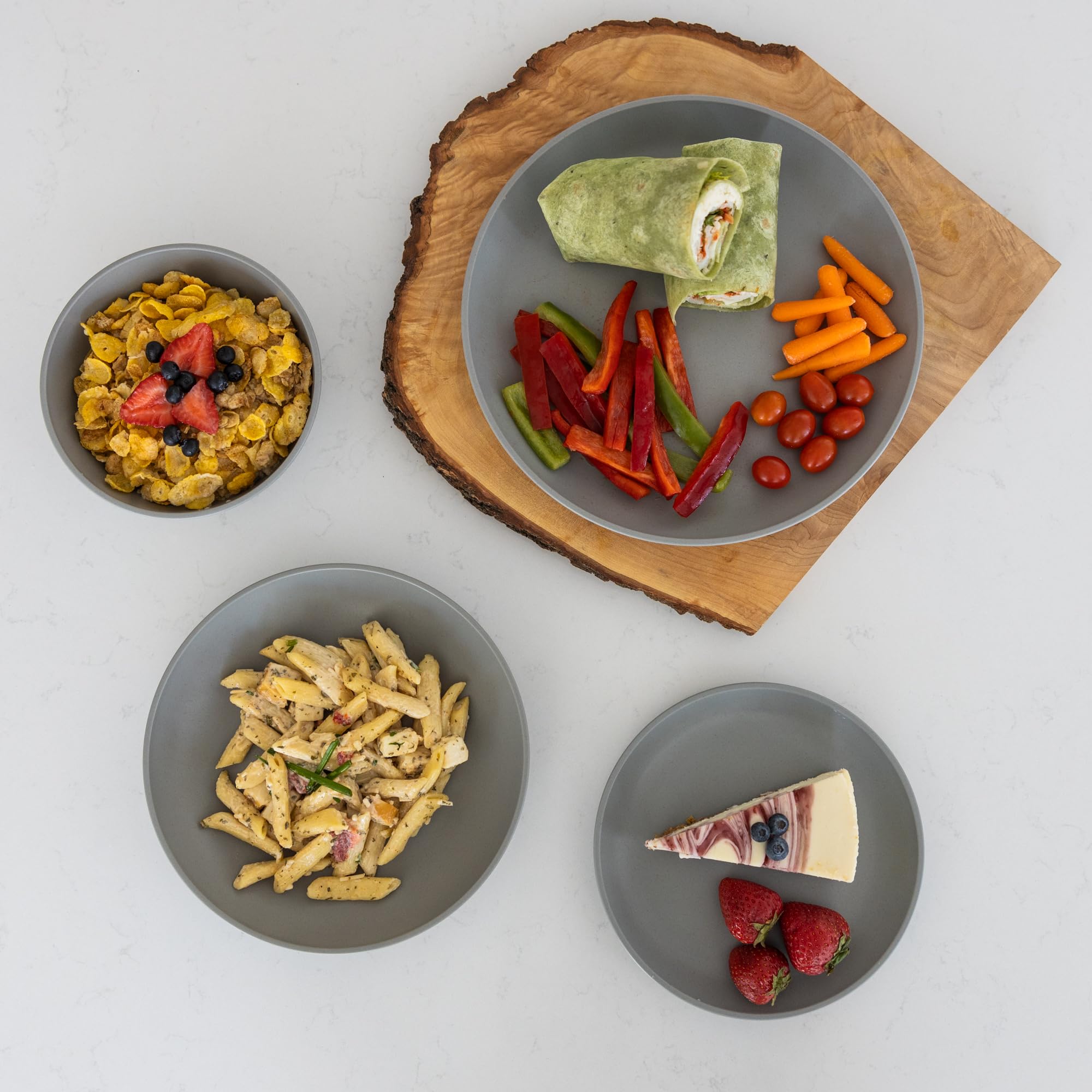 Grow Forward stacked plates beside standard fork demonstrating compact storage
