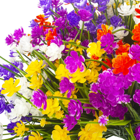 Grunyia floral bundles attached to porch rail for weatherproof decoration