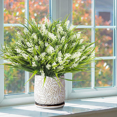 Grunyia close-up of small white flowers highlighting lifelike placement and decorative appeal