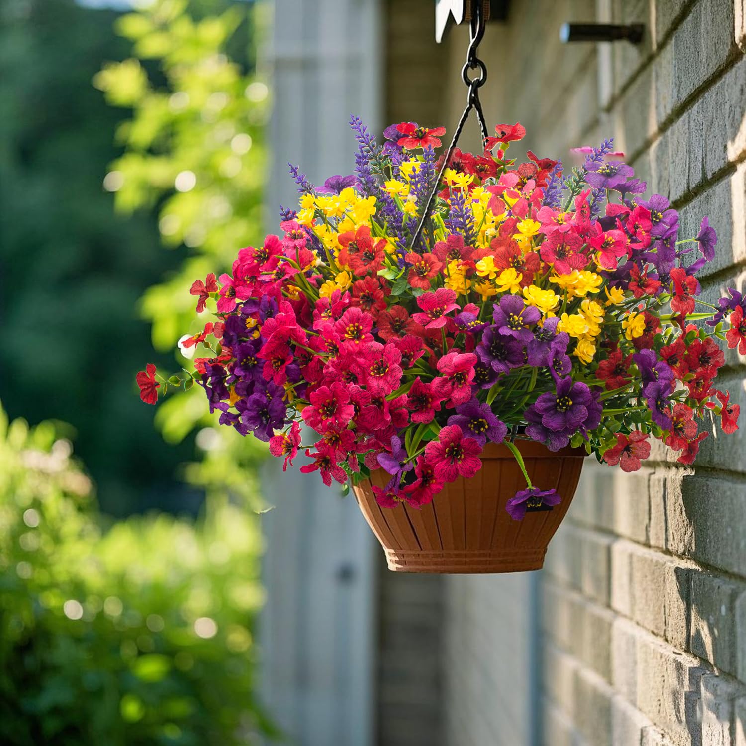 Grunyia artificial flowers in hanging basket on porch demonstrating weatherproof decoration