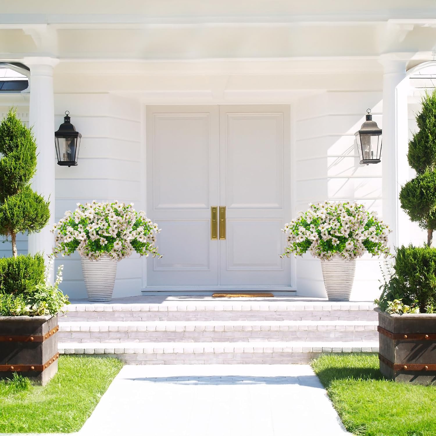 Grunyia porch planter display with daisies adding year-round curb appeal and low maintenance