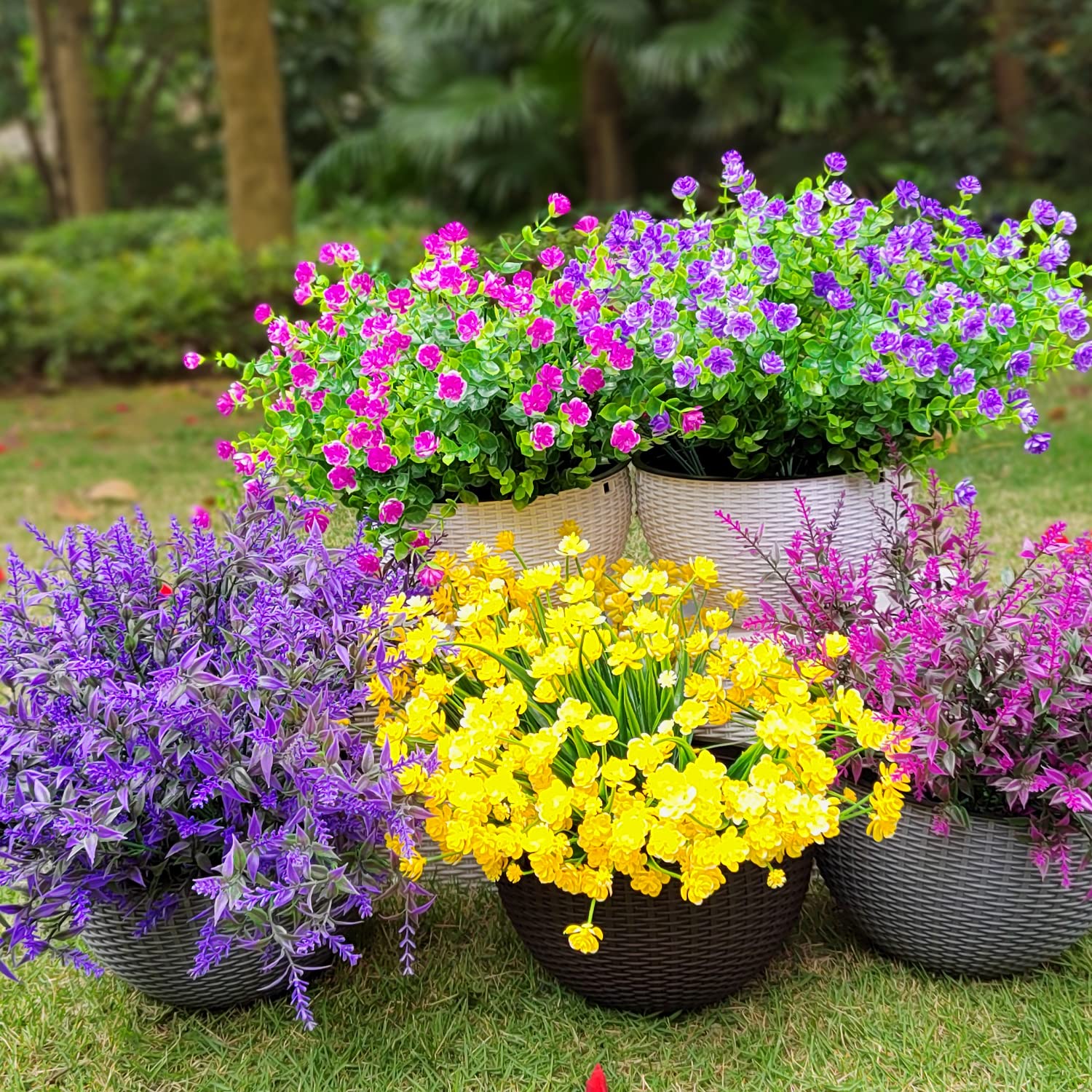Grunyia used in a wedding centerpiece providing long-lasting decorative blooms