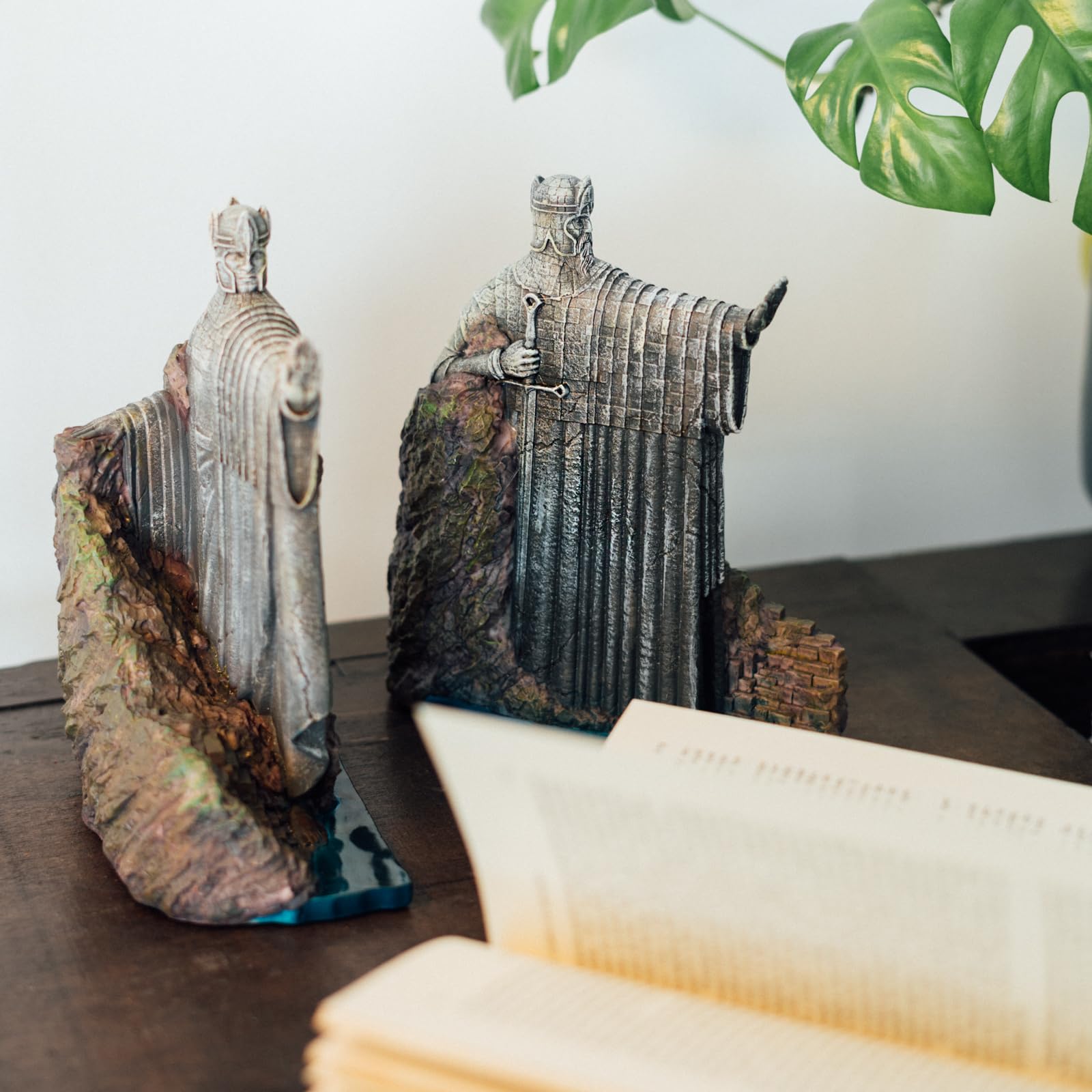 Grupo Erik Argonath on a bookshelf holding books and adding atmosphere