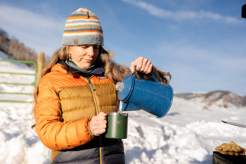 GSI Outdoors percolator sitting on a propane stove benefit: versatile stove-top use
