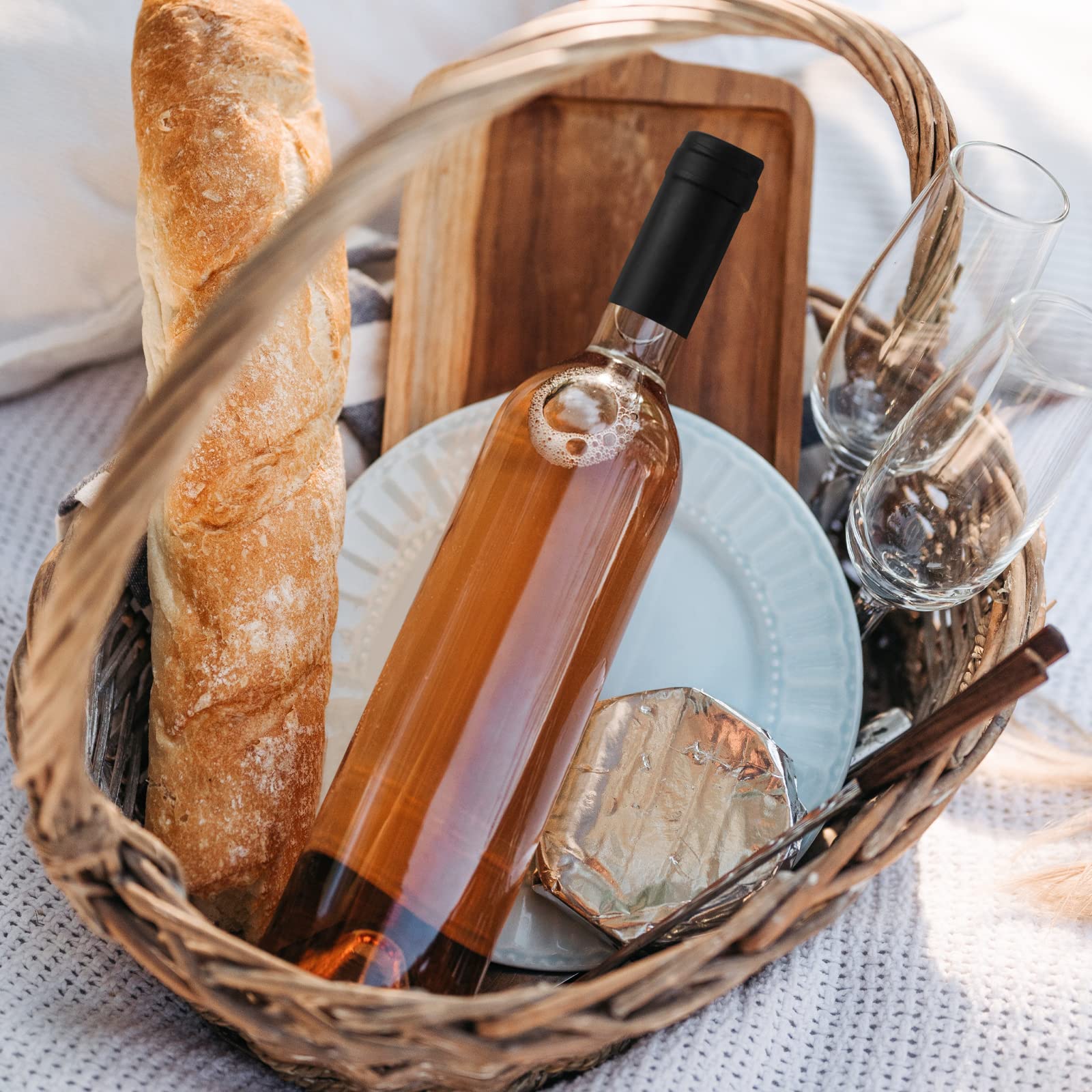 GUANENA bottles being filled with kombucha showcasing home-brewing convenience